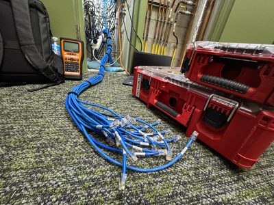 Certified network cabling in a Brisbane comms cabinet